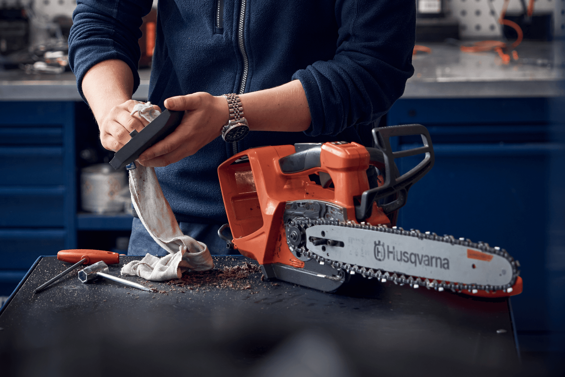 Chainsaw on work bench being repaired